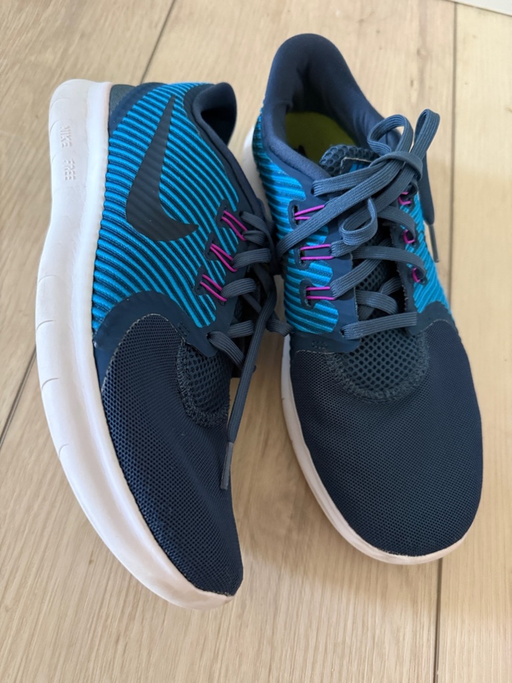 Nike Women's Navy Blue and Teal Athletic Running Shoes with Pink Accents